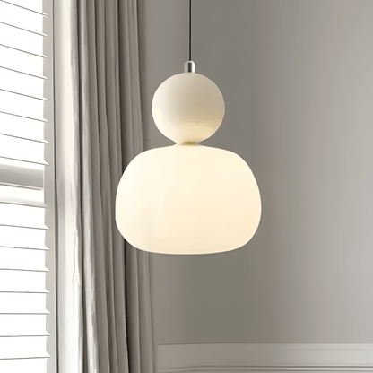 BauGlow beige con vetro opalino accesa vicino a una finestra