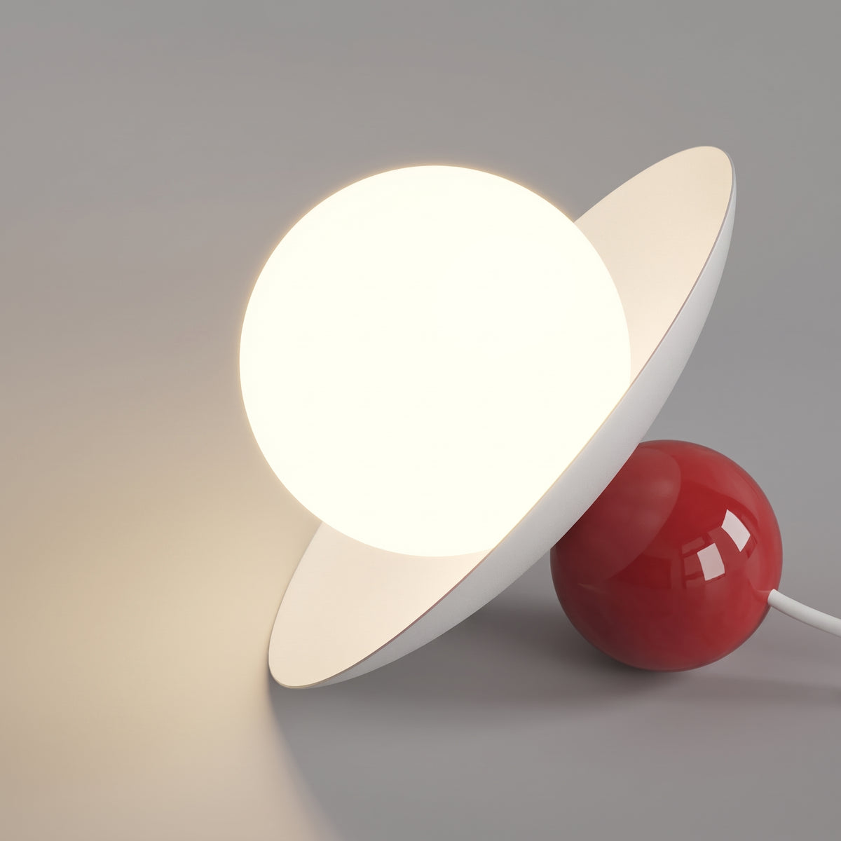 Dettaglio di Burano: sfera rossa, disco bianco e globo opalino