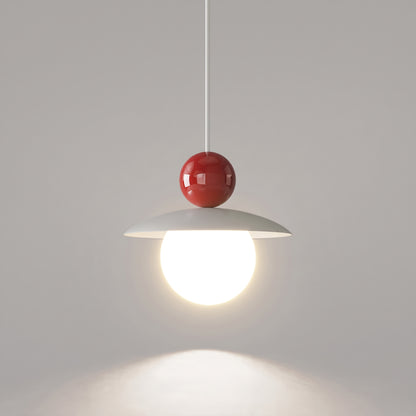 Burano con sfera rossa accesa su sfondo grigio