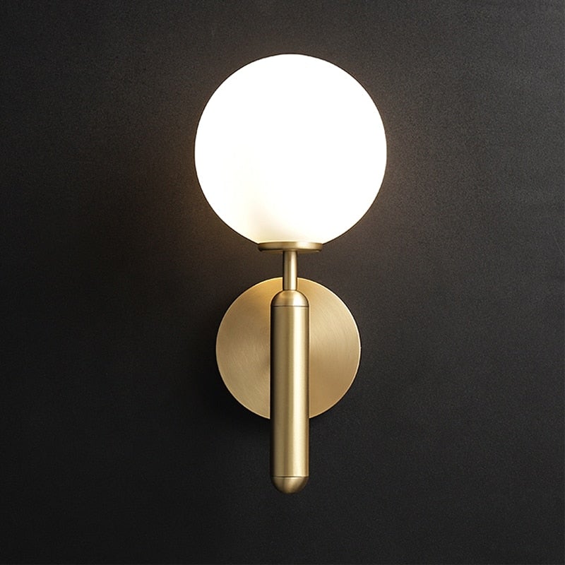 Lampada da parete GlassGem con sfera in vetro