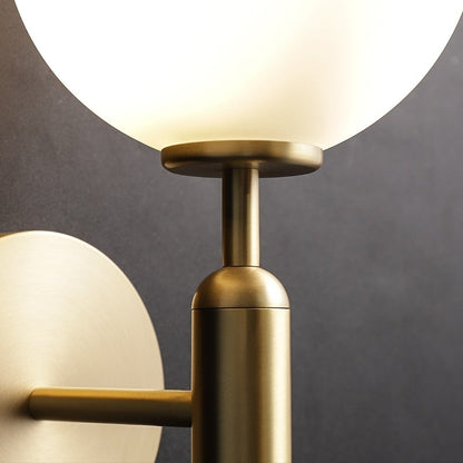Lampada da parete GlassGem con sfera in vetro