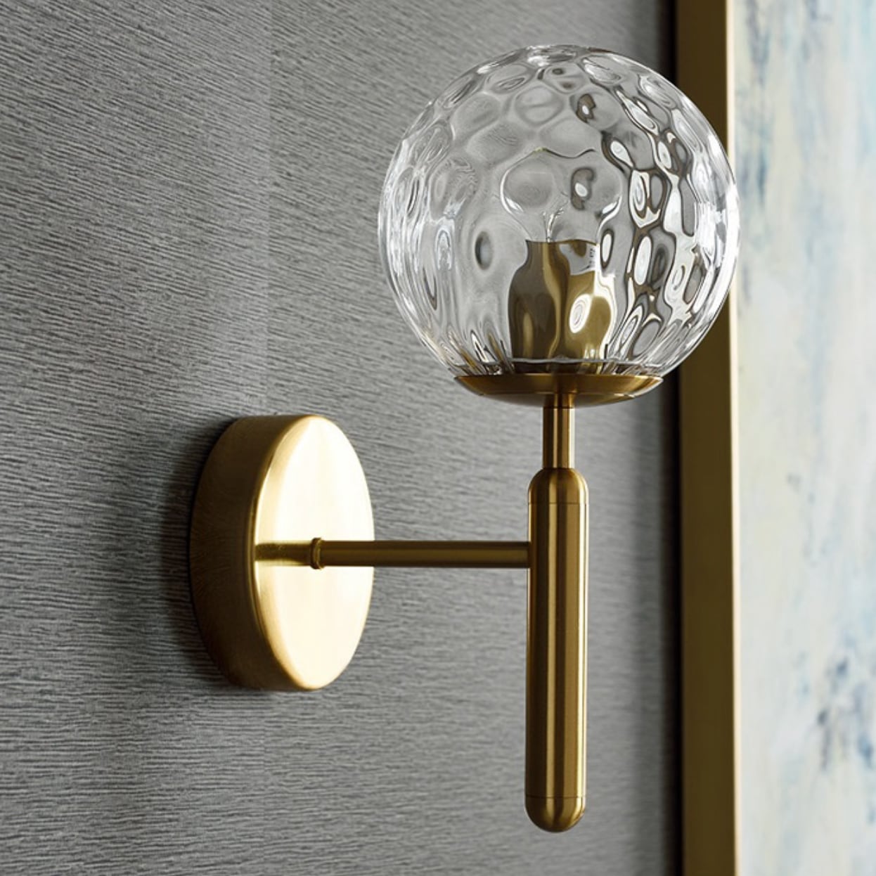 Lampada da parete GlassGem con sfera in vetro