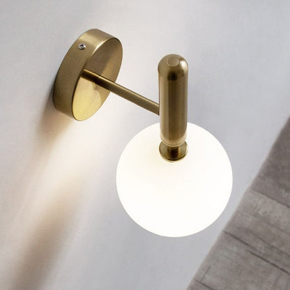 Lampada da parete GlassGem con sfera in vetro