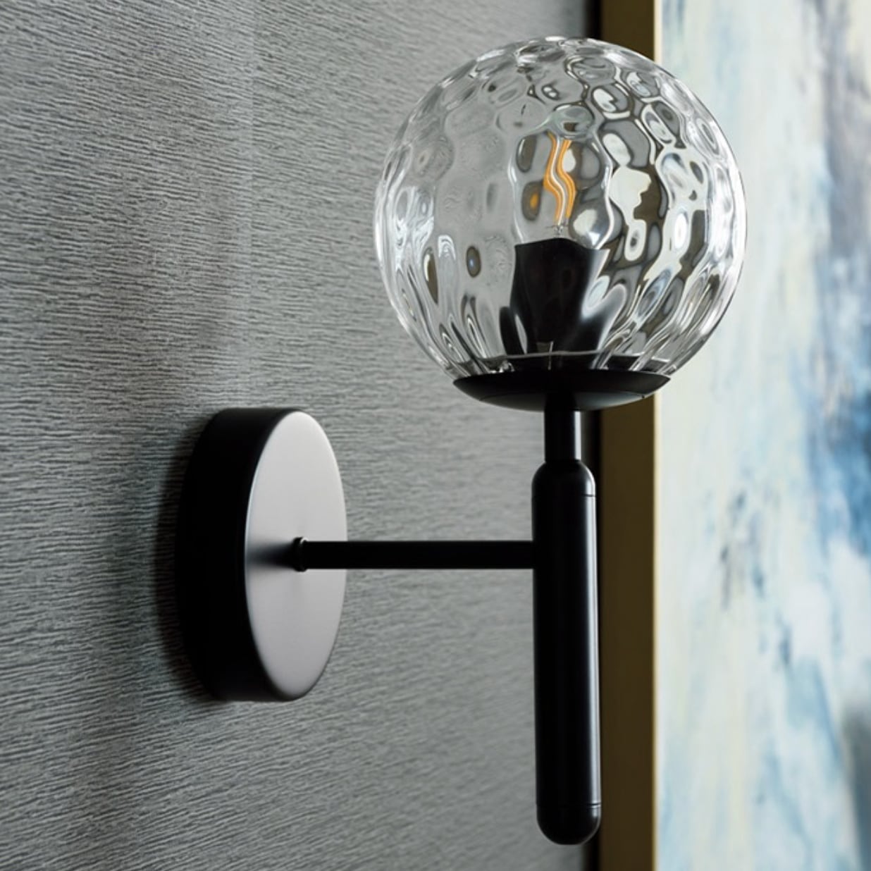 Lampada da parete GlassGem con sfera in vetro