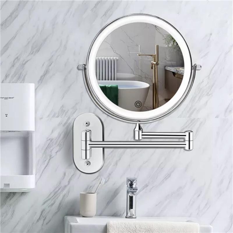 ReflecView specchio ingranditore da parete con luce LED ricaricabile e braccio estensibile: in un bagno con parete in marmo bianco, braccio esteso - Luximode