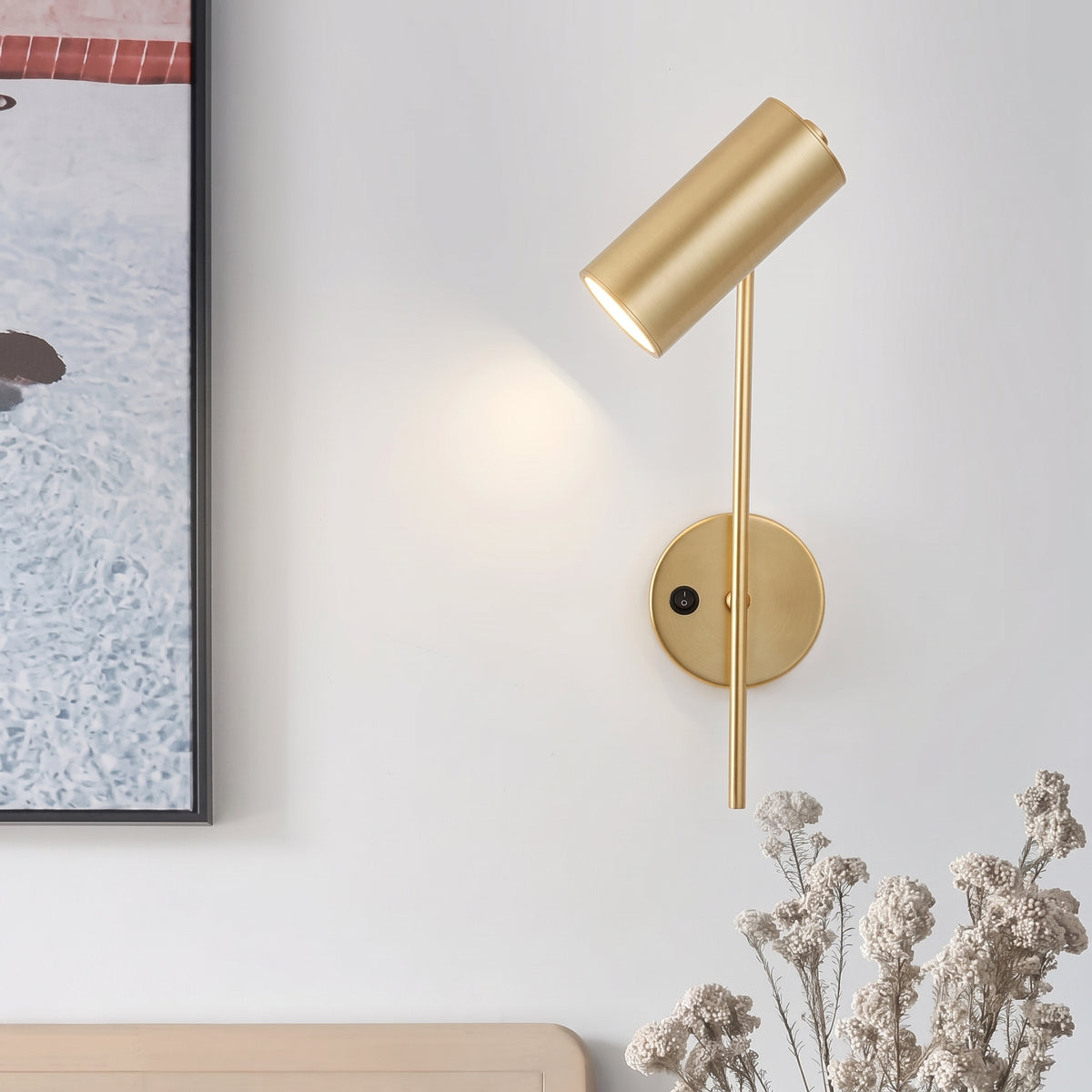 Applique Todi oro con la testa orientata verso il basso
